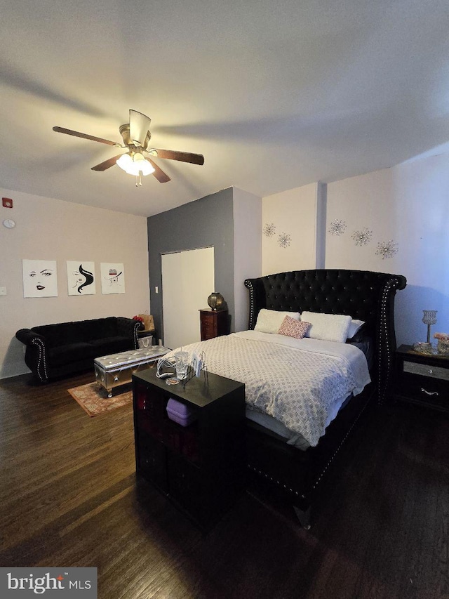 bedroom featuring hardwood / wood-style floors and ceiling fan