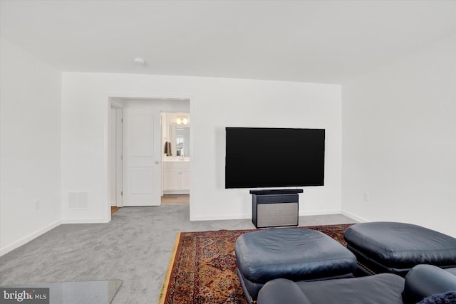 living room featuring light colored carpet