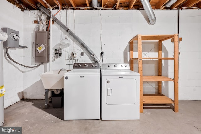 laundry area featuring washing machine and dryer and electric panel