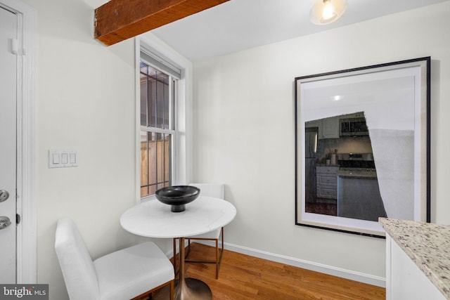 dining area with hardwood / wood-style flooring