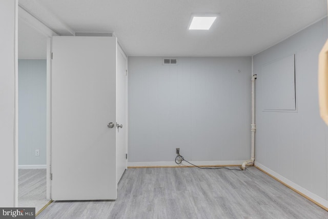 empty room featuring light hardwood / wood-style floors