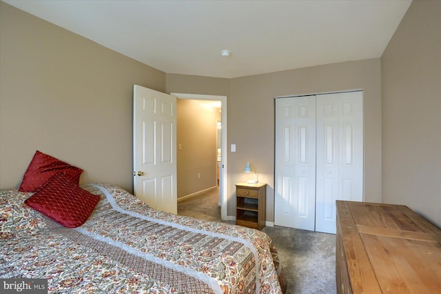 carpeted bedroom featuring a closet