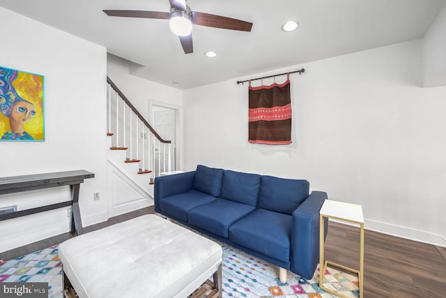 living room with ceiling fan and hardwood / wood-style floors