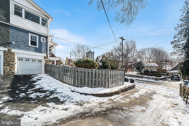 exterior space featuring a garage