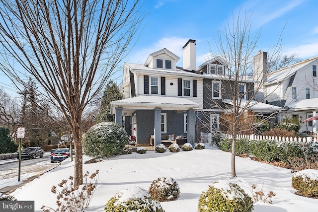 view of front of home featuring covered porch