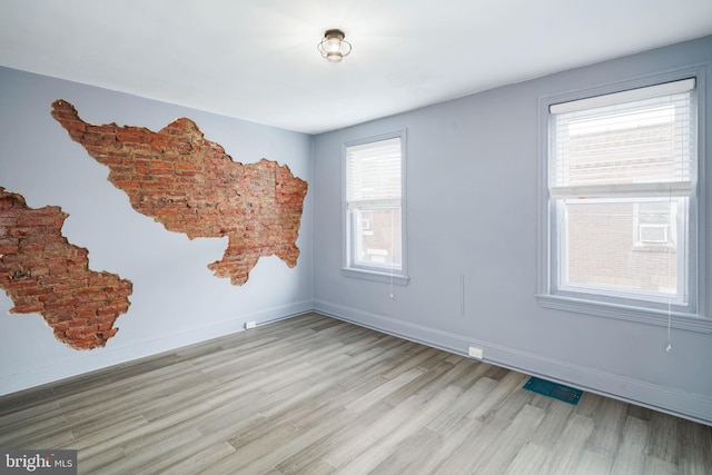 empty room with light wood-type flooring