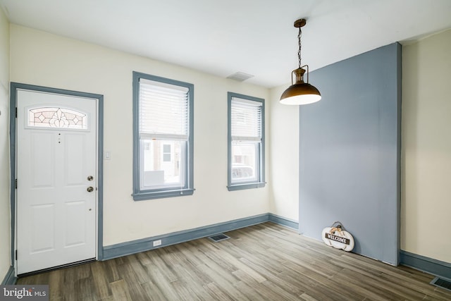 foyer entrance featuring hardwood / wood-style flooring