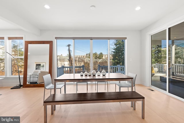 dining space featuring light hardwood / wood-style flooring