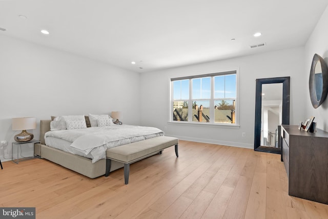 bedroom featuring light wood-type flooring