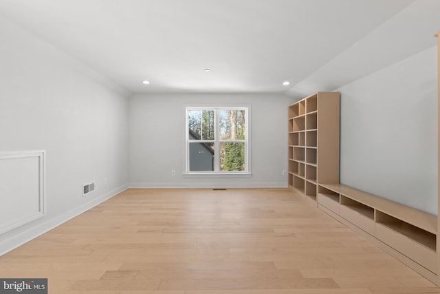 empty room with light wood-type flooring