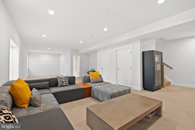 living room featuring light colored carpet