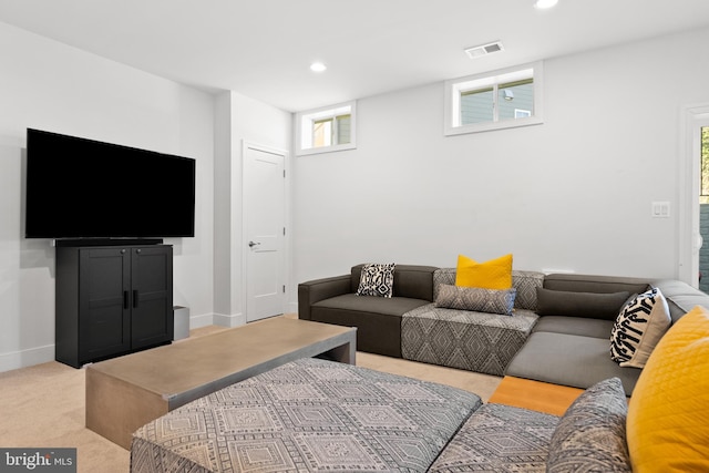 living room featuring light carpet