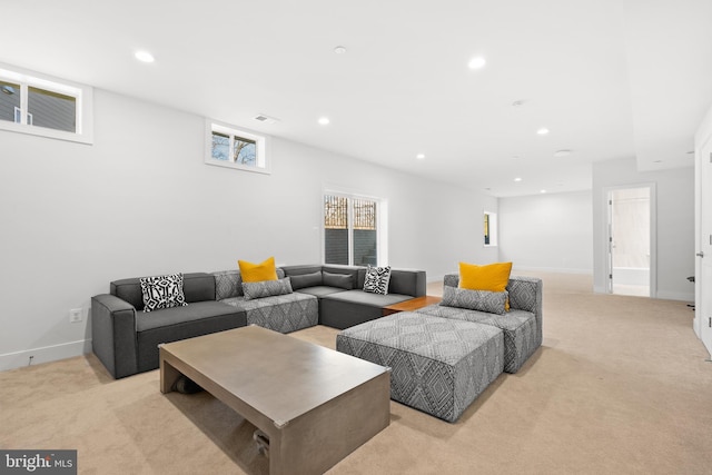 living room featuring light colored carpet