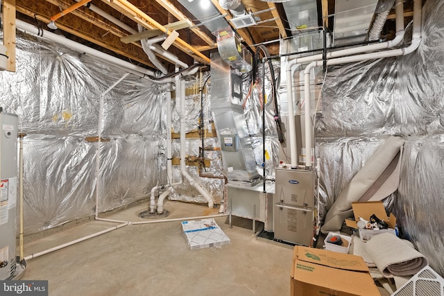 utility room featuring electric water heater