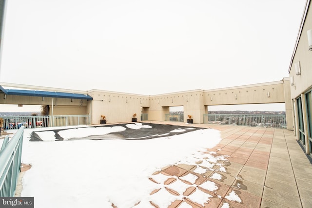 view of snow covered patio