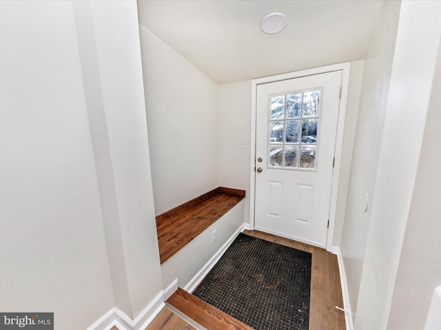 doorway with hardwood / wood-style floors