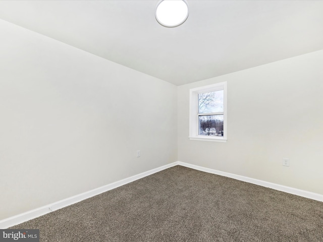 unfurnished room with carpet floors