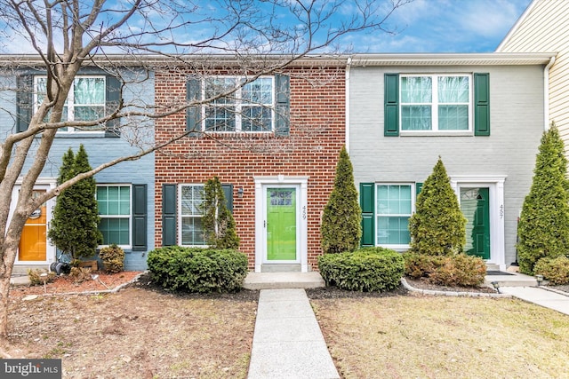 view of front of home with brick siding