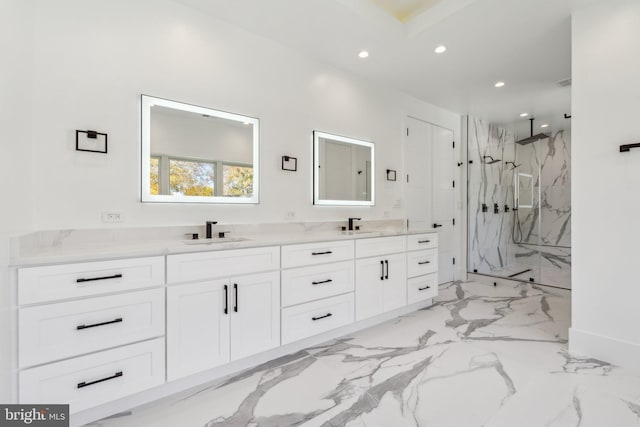 bathroom featuring vanity and tiled shower