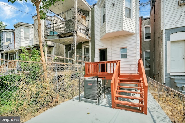 exterior space featuring central AC unit