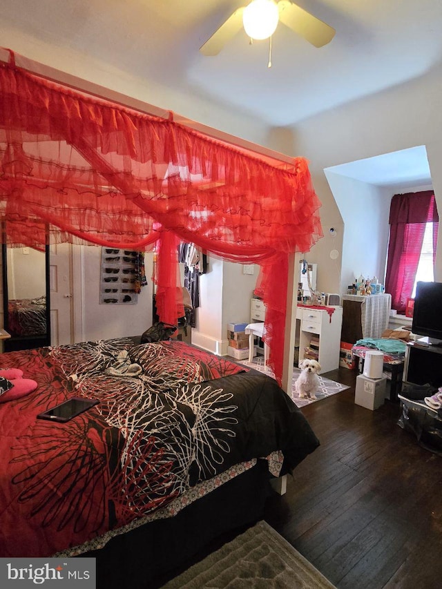 bedroom featuring hardwood / wood-style floors and ceiling fan