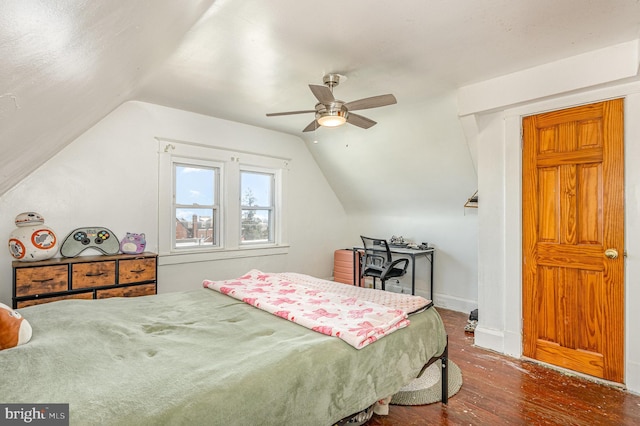 bedroom with lofted ceiling, ceiling fan, baseboards, and wood finished floors