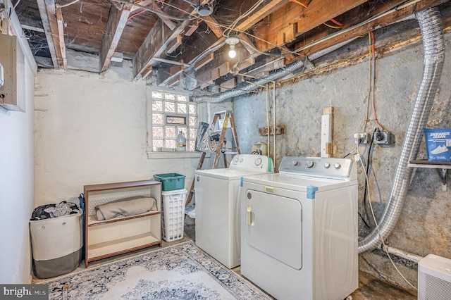laundry area featuring laundry area and washer and clothes dryer