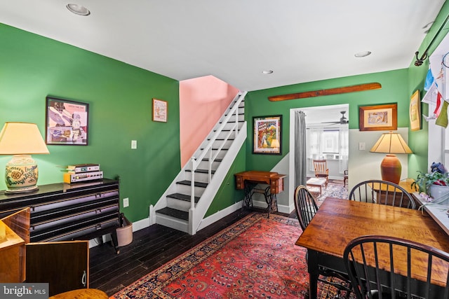 dining room with dark wood-type flooring