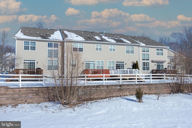 view of snow covered property