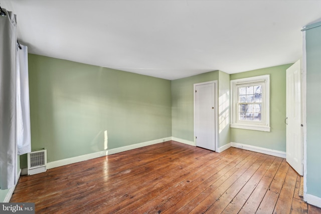 interior space with hardwood / wood-style flooring