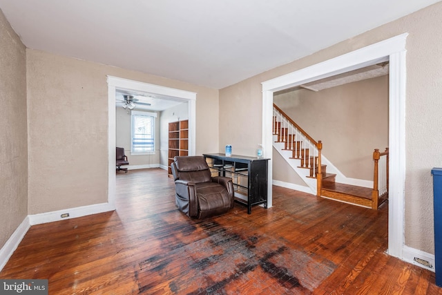 sitting room featuring dark hardwood / wood-style flooring