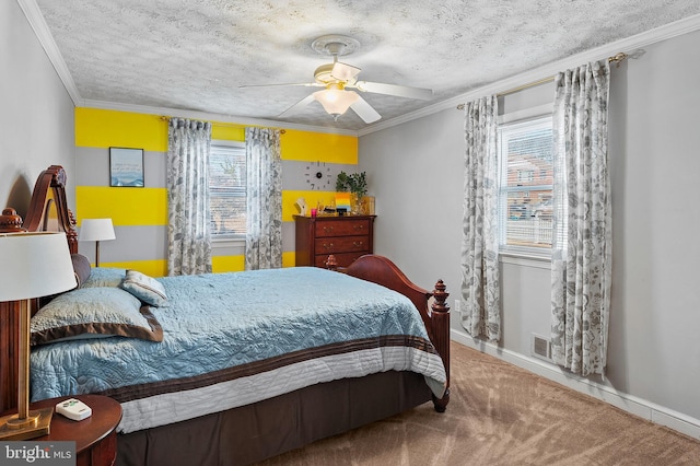 carpeted bedroom with crown molding, a textured ceiling, and ceiling fan