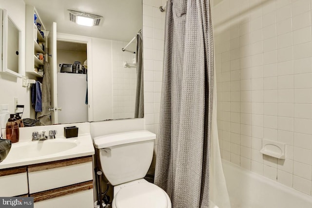 bathroom featuring toilet, shower / bath combo, visible vents, and vanity