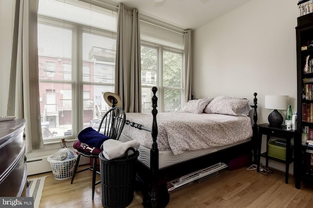 bedroom featuring light wood-type flooring