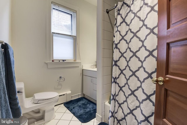 full bathroom featuring toilet, vanity, baseboard heating, tile patterned floors, and shower / bathtub combination with curtain