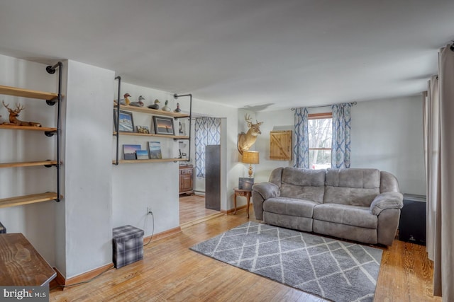 living room with light hardwood / wood-style floors