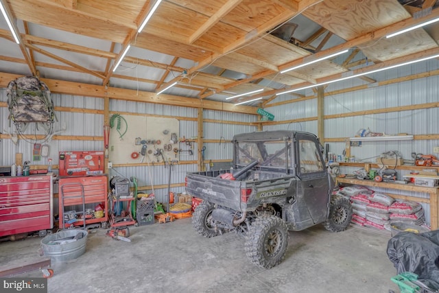 garage featuring a workshop area