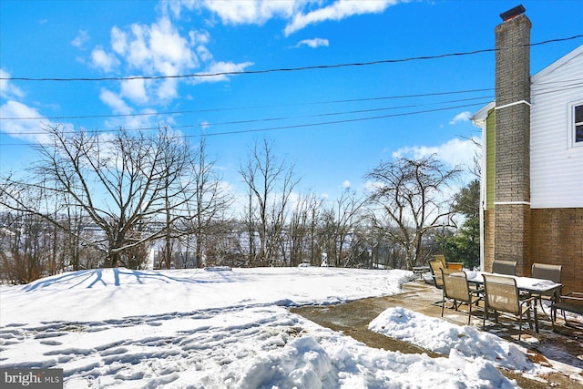 view of snowy yard