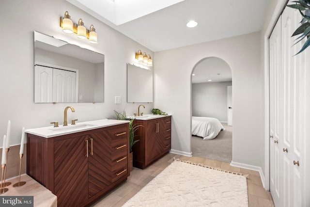 bathroom featuring vanity and tile patterned floors