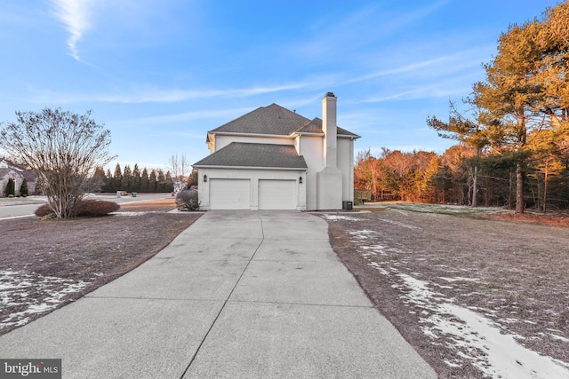 view of home's exterior with a garage