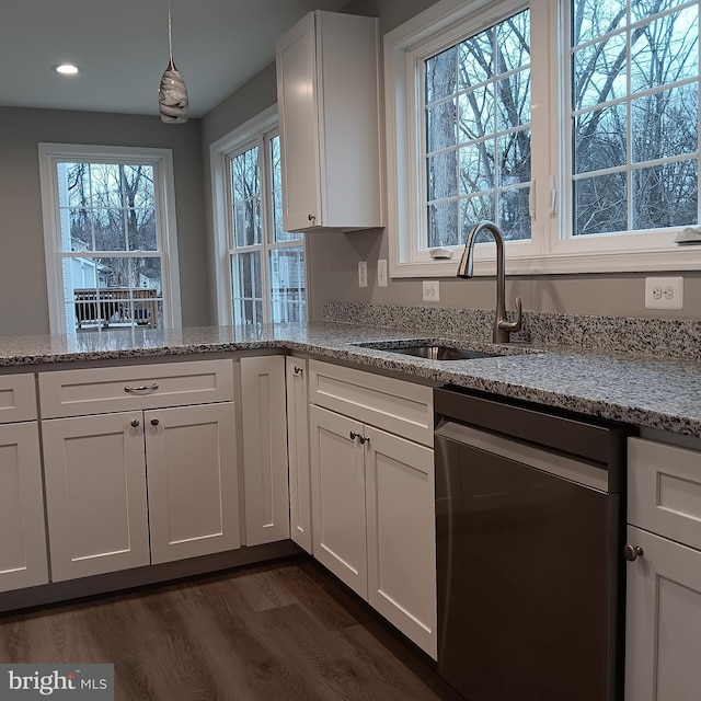 kitchen with sink, dark wood-type flooring, dishwasher, white cabinetry, and light stone countertops