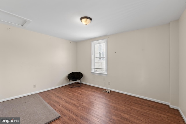 empty room with hardwood / wood-style floors