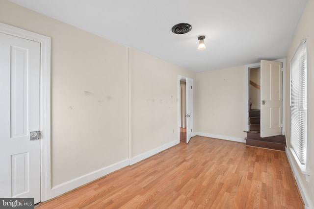 unfurnished bedroom featuring light hardwood / wood-style flooring