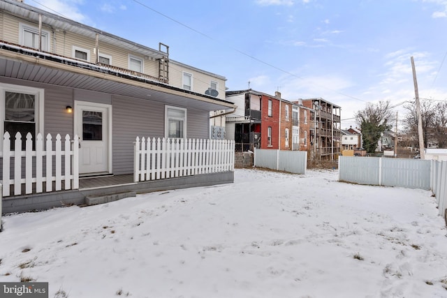 view of snow covered property