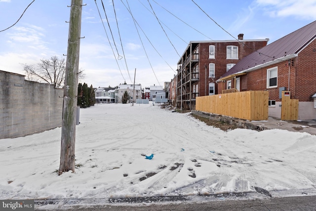 view of yard covered in snow