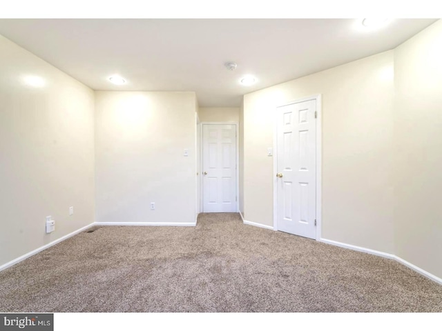 empty room with carpet floors