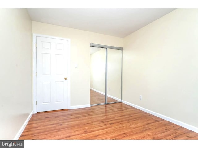 unfurnished bedroom with light hardwood / wood-style flooring