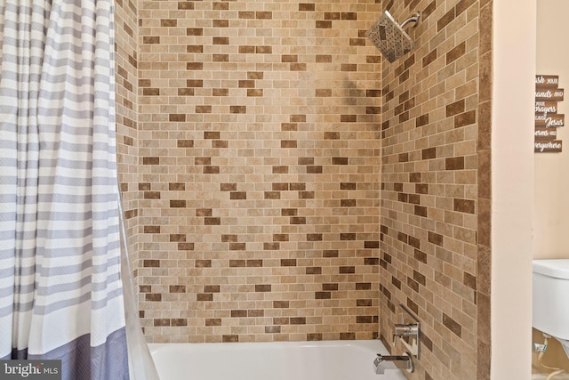 bathroom featuring shower / bath combination with curtain