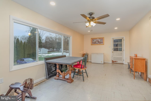 dining space with ceiling fan