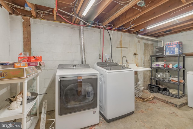 washroom with separate washer and dryer